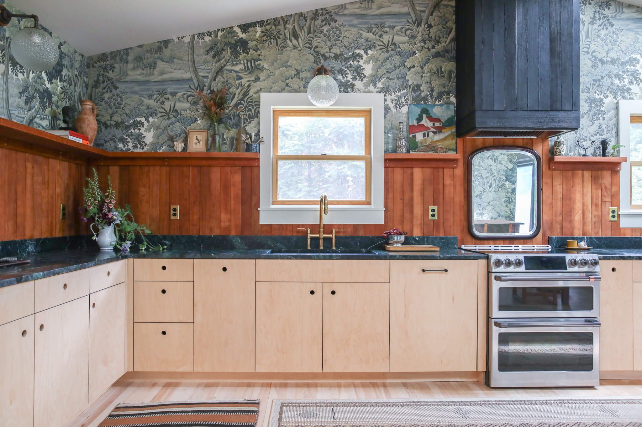 Plywood kitchen cabinets in Northampton, MA. We designed and built this plywood cabinetry in this eclectic kitchen to compliment the antique brass fixtures and cherry wood backsplash.